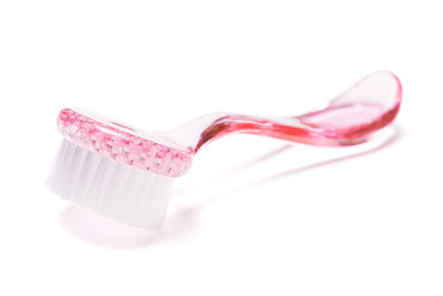 Manicure brush with transparent plastic handle pink